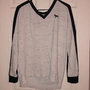 Sweater with cute Pink detailing.